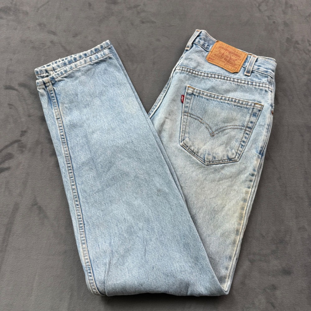 Vintage Levis 550 Relaxed Fit Jeans Light Wash Made in USA 33x34 Distressed